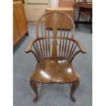 A stained beech Windsor armchair