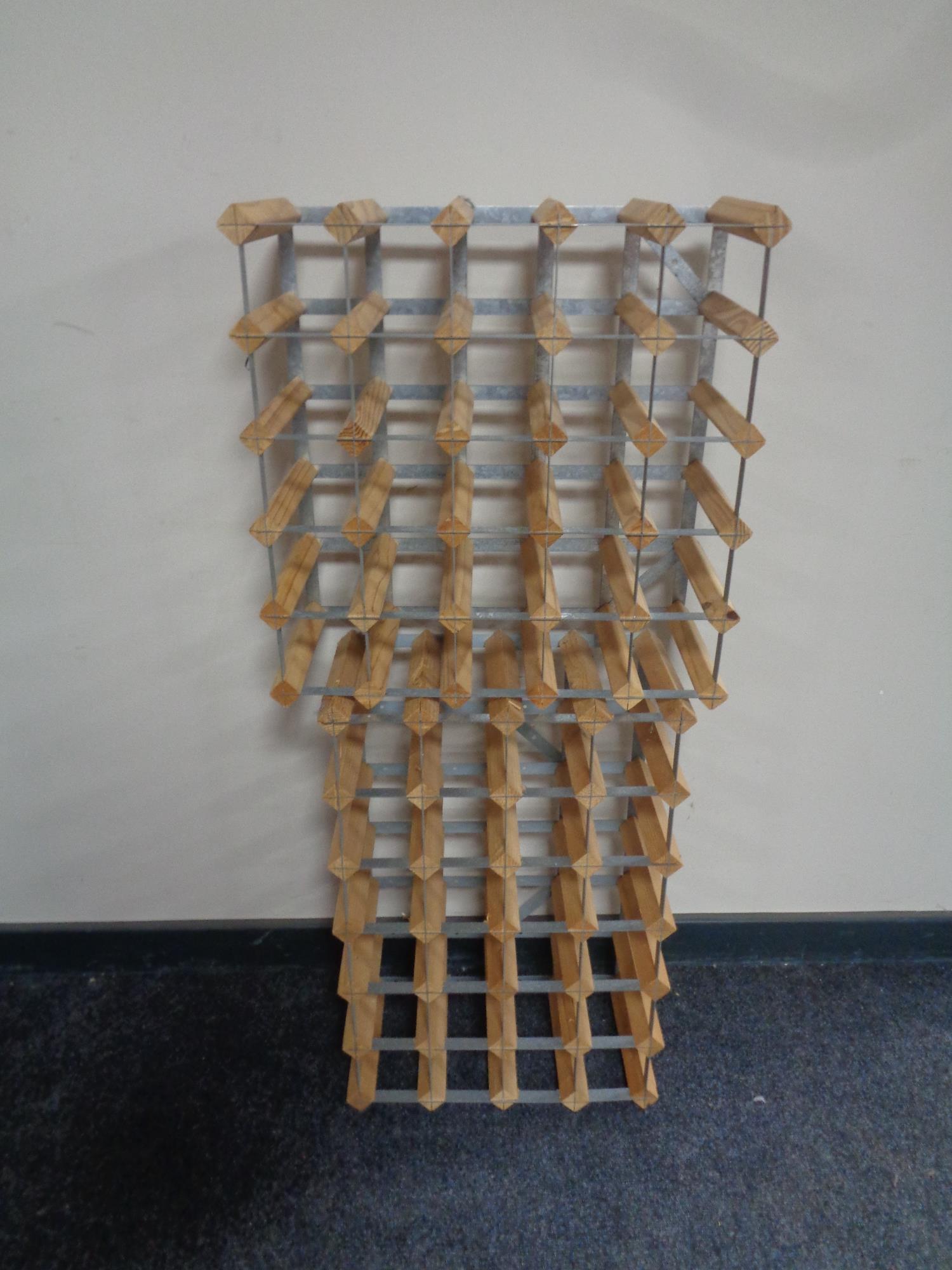 Two pine and metal wine racks