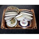 A box of a large quantity of wall and cabinet plates to include Franklin Porcelain flowers of the
