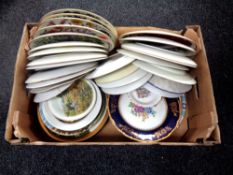 A box of a large quantity of wall and cabinet plates to include Franklin Porcelain flowers of the