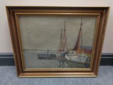 A continental school oil on canvas, fishing boats at dock, indistinctly signed,