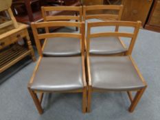 A set of four mid 20th century Danish oak dining chairs