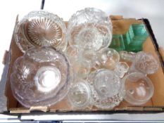 A box containing assorted glassware to include cut glass and pressed glass fruit bowls, vases,