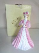 A Coalport limited edition figure Emily 3795, exclusively produced for Ringtons, boxed.