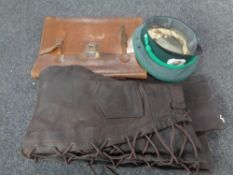 A box containing vintage leather satchel,