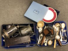 Two trays of silver plated cutlery, cased carving sets, two silver plated teapots,