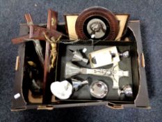 A box containing holy communion sets, crucifixes,