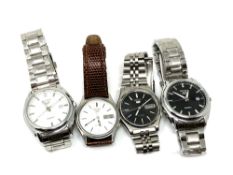 Four gent's stainless steel Seiko wristwatches (two quartz,