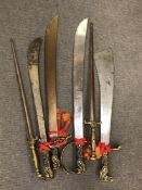 Six brass ornamental swords (6)