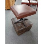 A mid 20th century brown leather cube footstool together with a further footstool on metal legs