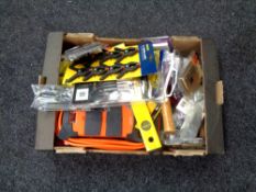 A box of extension leads, brushes, socket covers,