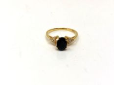 A 14ct gold sapphire and diamond ring, size M CONDITION REPORT: 1.9g.