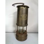 A brass Hockley Lamp and Limelight Company miner's lamp