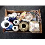 A box containing oriental style china to include lidded pots, vases,