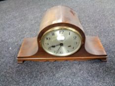 A 20th century eight day mantel clock with silver dial