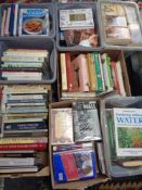 A pallet containing eight boxes and crates of books,