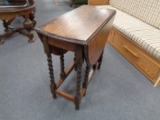 An early 20th century oak gateleg table