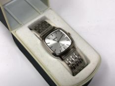 A gent's Lorus stainless steel quartz calendar wristwatch, boxed.