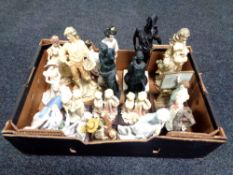 A box containing assorted contemporary figurines to include Armani