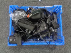 A basket containing a large quantity of assorted video cameras and cameras to include JVC, Kodak,