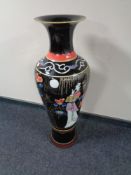A Japanese floor standing vase depicting a geisha,