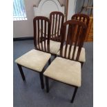 A set of four beech railback kitchen chairs