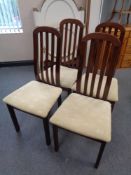 A set of four beech railback kitchen chairs