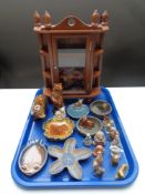 A tray containing Wade whimsies and dishes, a miniature Curio cabinet,