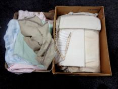 Two boxes containing assorted linen and curtains