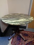 A marble topped pedestal occasional table