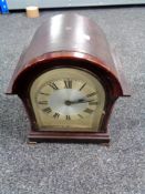 An Edwardian bracket clock with silver dial (electric)