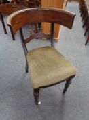 A mahogany shaped back elbow chair