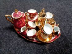 A fifteen piece Bavarian gilded tea service on tray together with a further fifteen piece Bavarian