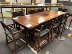 A heavy quality South African ironwood refectory dining table, on X-frame base, 100 cm x 270 cm,