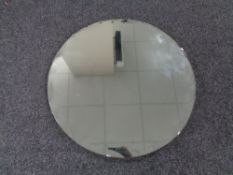 A 1930's circular un-framed mirror