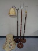 Three 20th century continental standard lamps,