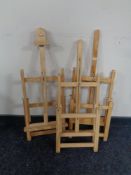 Three pine artist's easels