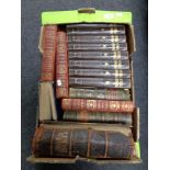 A box containing antique and later volumes to include leather bound Holy Bible,