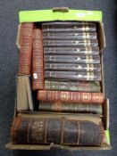 A box containing antique and later volumes to include leather bound Holy Bible,
