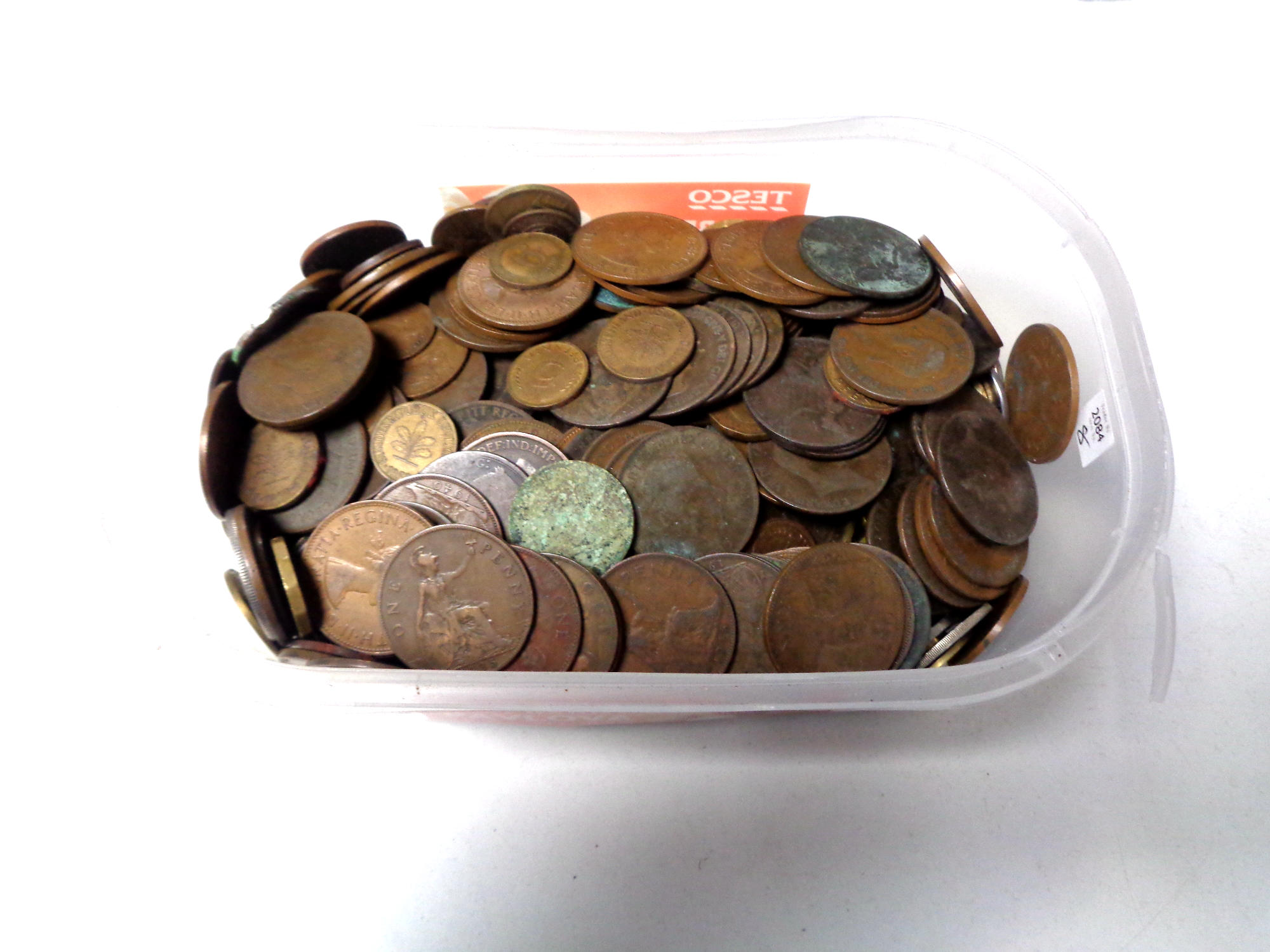 A tub containing a quantity of Victorian and Georgian copper coinage