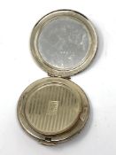 A silver compact