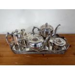 A silver plated twin handled tray together with five further pieces of plated tea ware