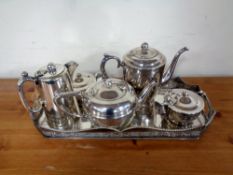A silver plated twin handled tray together with five further pieces of plated tea ware