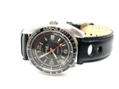 A Gentleman's Avi-8 sports watch on black leather strap