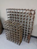 Two wooden and metal wine racks