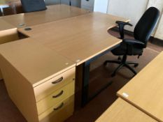 A beech effect desk, width 180 cm, together with three drawer chest and swivel chair.