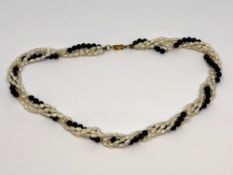 A pearl and agate necklace with 9ct gold clasp and beads