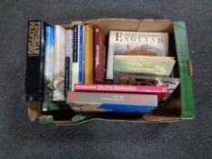 A box containing coffee table art books