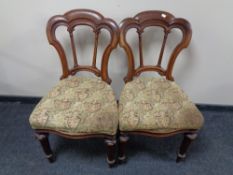 A pair of Victorian mahogany dining chairs