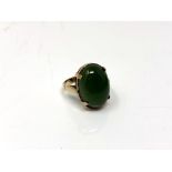 A 9ct gold jade ring, size M CONDITION REPORT: 5.